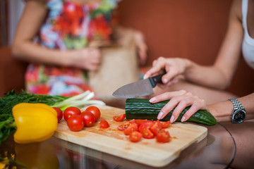 Women hands preparing dinner in a kitchen concept cooking, culinary