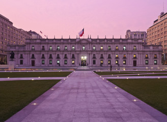 Chile, Santiago, Twilight view of La Moneda Palace from the Plaza de la Ciudadania.