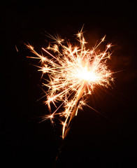 Fototapeta premium Christmas bengal fire isolated on black background
