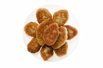 food chicken patties on a plate on a white background