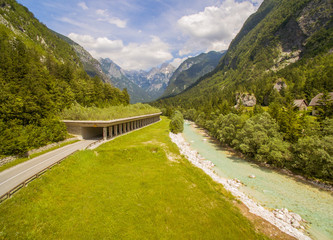 Aerial: Beautiful Mountain Valley Landscape With Tunnel And River View