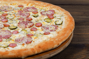 Delicious italian pizza served on wooden table