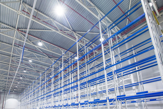 Large cold distribution warehouse with high empty shelves