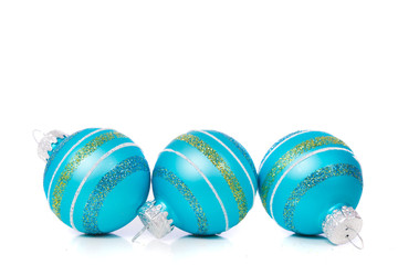 Blue Christmas Ornaments on white background with copy space