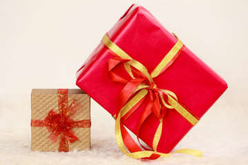 Two gift boxes red and golden