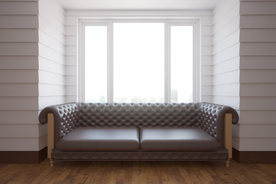 Brown sofa in white room