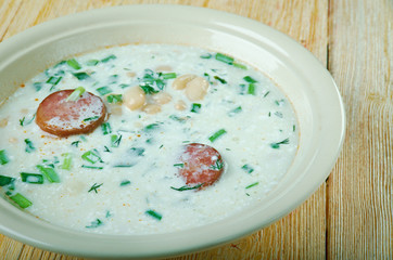 Soup with beans, sour cream and sausage