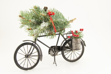Fototapeta na wymiar toy bicycle with christmas decorations