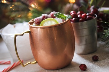 Cranberry Moscow Mule against holiday xmas background