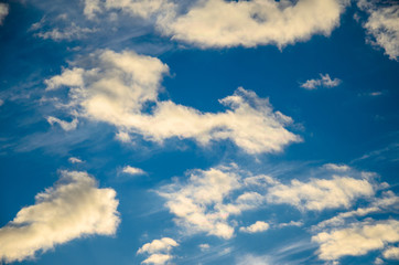 White clouds in deep blue sky