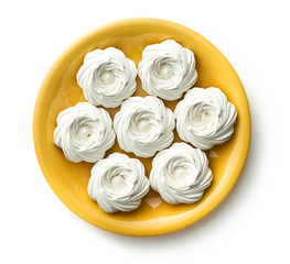 Sweet white meringue on plate.