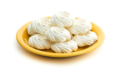 Sweet white meringue on plate.