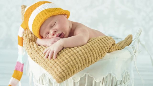 Little, newborn child having a nap