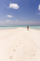 Woman Walking Alone in The Maldives