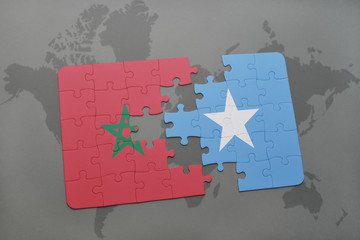puzzle with the national flag of morocco and somalia on a world map