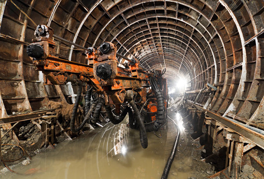 Drilling machine in the tunnel. Subway tunnel in construction