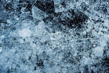 The texture of ice on the street in December