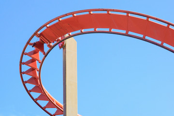 Rollercoaster against blue sky in the evening