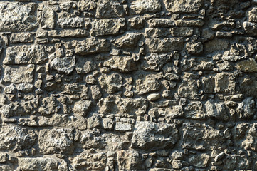 Gray rough stone wall background