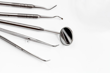 dental tools on white background top view