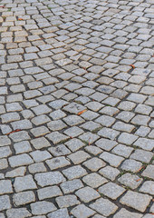 Fototapeta premium Gray cobblestone road background