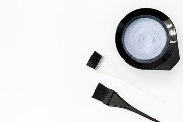 Tools for hair dye and hairdye top view white background