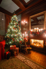 Calm image of interior Classic New Year Tree decorated in a room with fireplace
