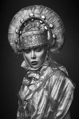 Woman in decorative kokoshnik head wear