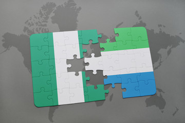 puzzle with the national flag of nigeria and sierra leone on a world map