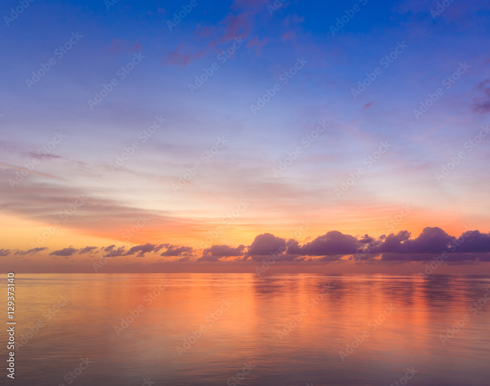 Wall mural sunset at Maldivian beach