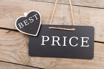 Blackboards with text "Best prise" on wooden background