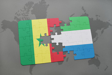 puzzle with the national flag of senegal and sierra leone on a world map