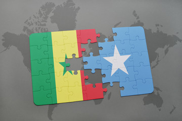 puzzle with the national flag of senegal and somalia on a world map