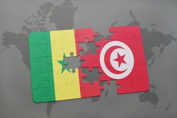 puzzle with the national flag of senegal and tunisia on a world map