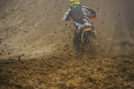 Motocross motorbike sprinkling mud