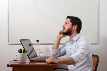 Man having phone call at office desk