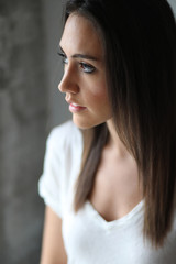 Beautiful Young Woman with Brown Hair and Eyes