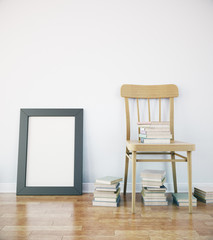 Fototapeta premium Chair and blank picture frame