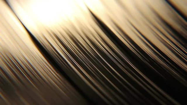 Closeup shot of a dusty old vinyl disc spinning on a record player