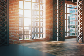 Fototapeta premium Red brick interior with city view