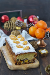 Christmas cake with dried fruits and tangerines