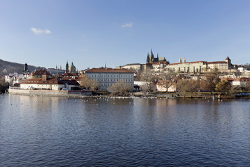 View on the winter Prague gothic Castle above River Vltava, Czech Republic
