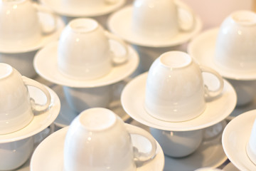 many white empty coffee cup preparation for coffee break