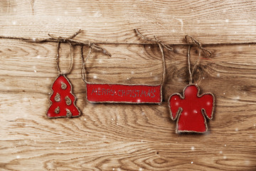 concept of Christmas.Christmas greetings on wooden background