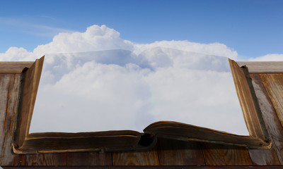 Book with landscape on pages . Mixed media