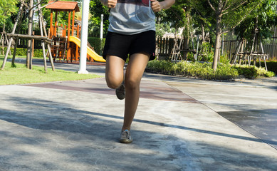Women running in a park.