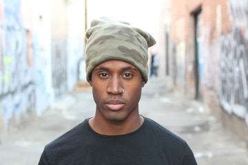Fancy young male with beanie and piercing