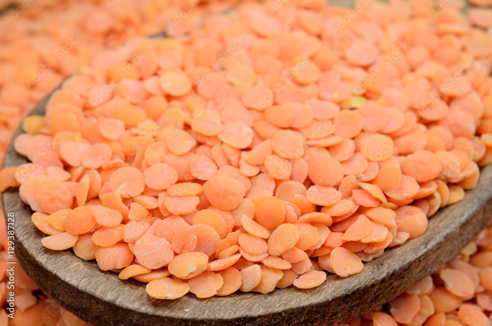 Wall mural lentil in spoon on table