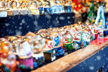Fototapeta na wymiar Snow Globes at Christmas Market