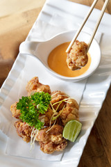 japanese food grilled chicken karage served with mayo sauce